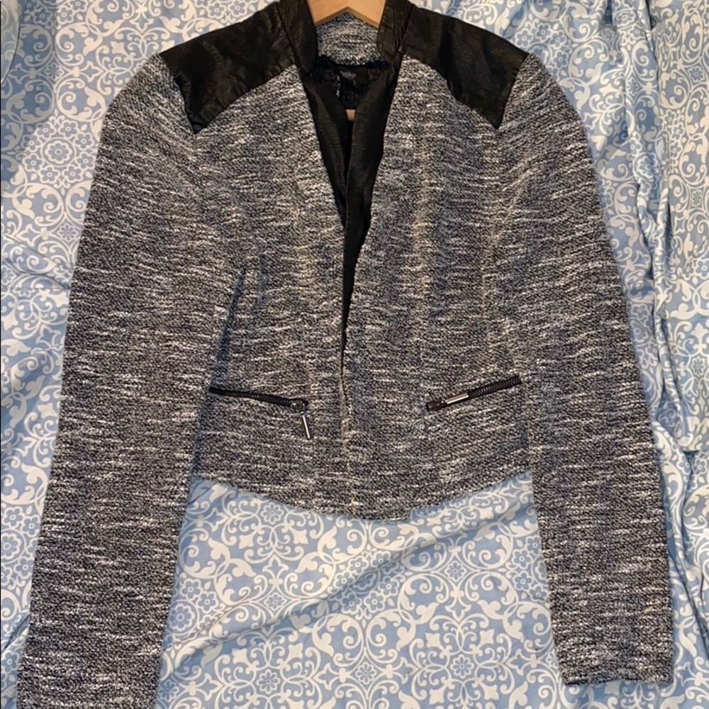 Grey and white jacket.